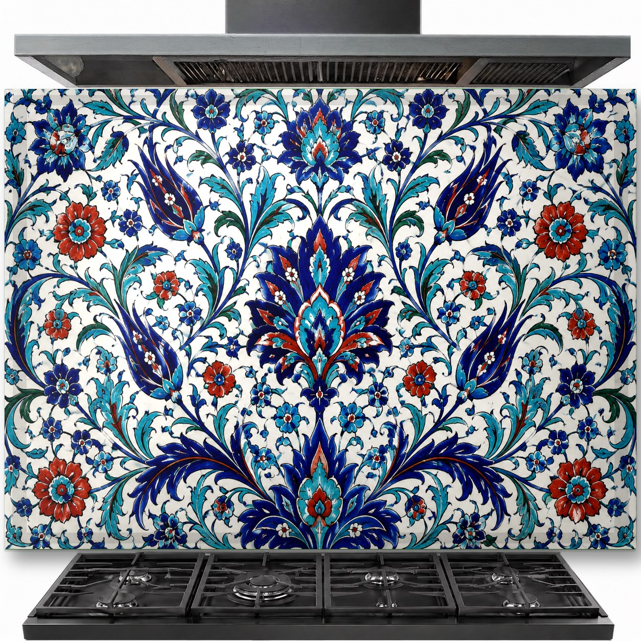 Traditional blue and white Iznik tile pattern on a tempered glass backsplash installed behind a modern gas stove.