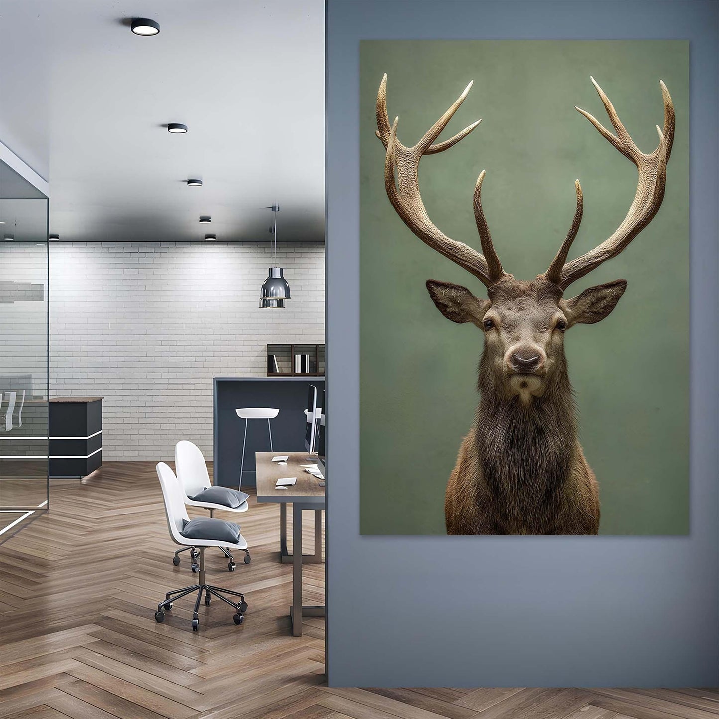 Modern office interior with a large deer head painting on the wall.