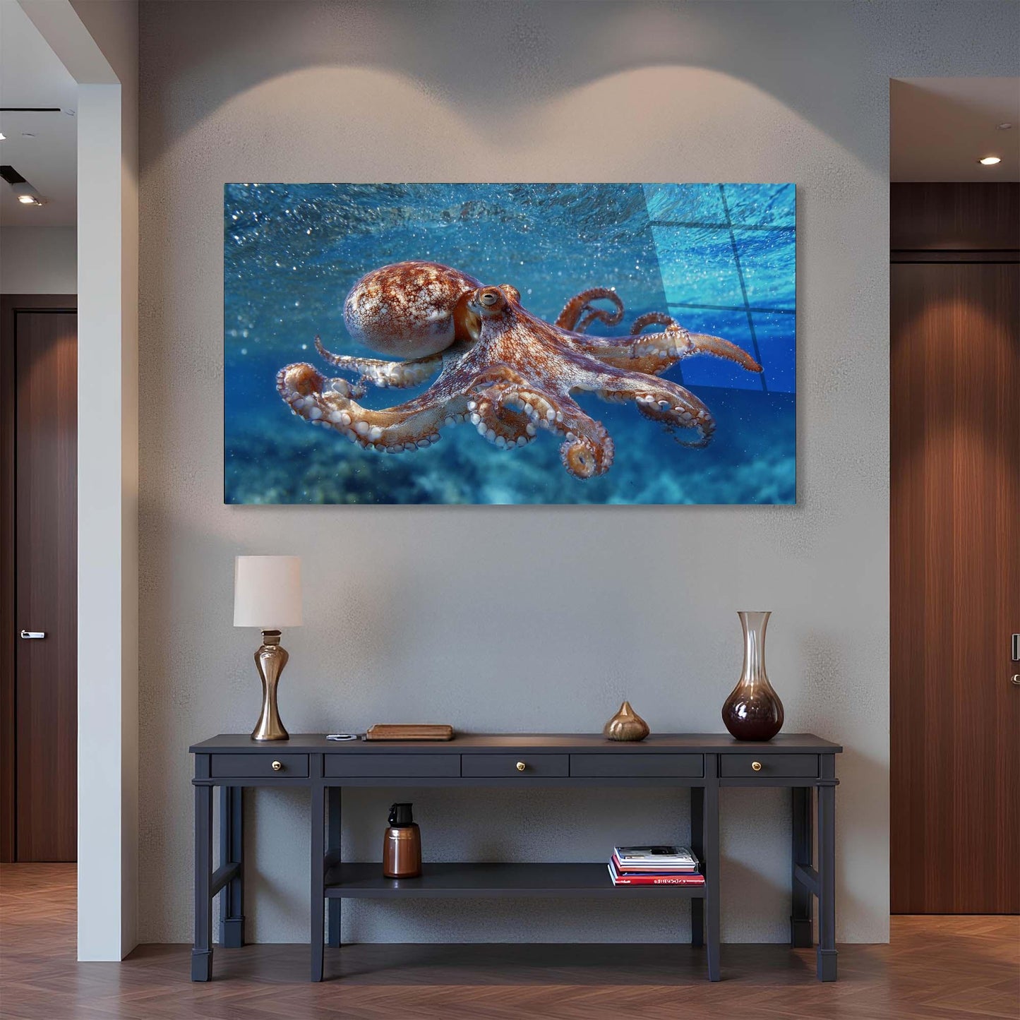 Wall art of an octopus in an underwater scene above a console table.