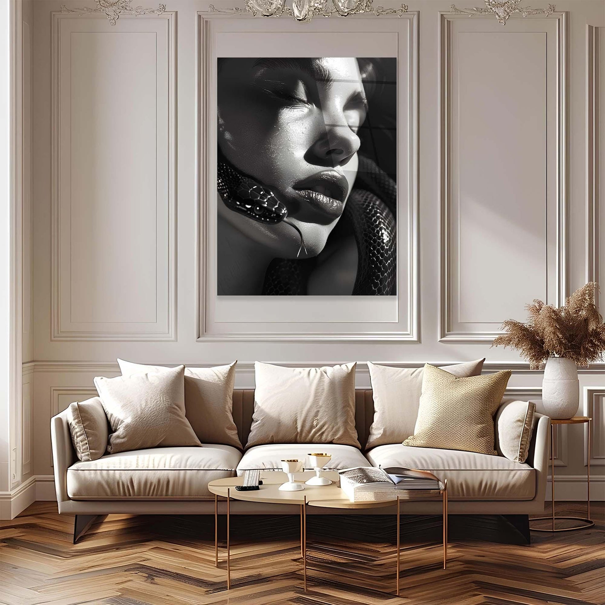 Modern living room with a beige sofa, coffee table, and framed artwork on the wall.