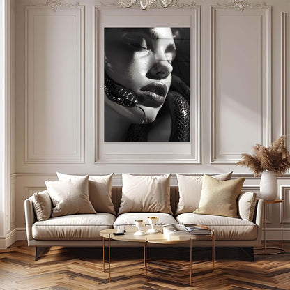 Modern living room with a beige sofa, coffee table, and framed artwork on the wall.