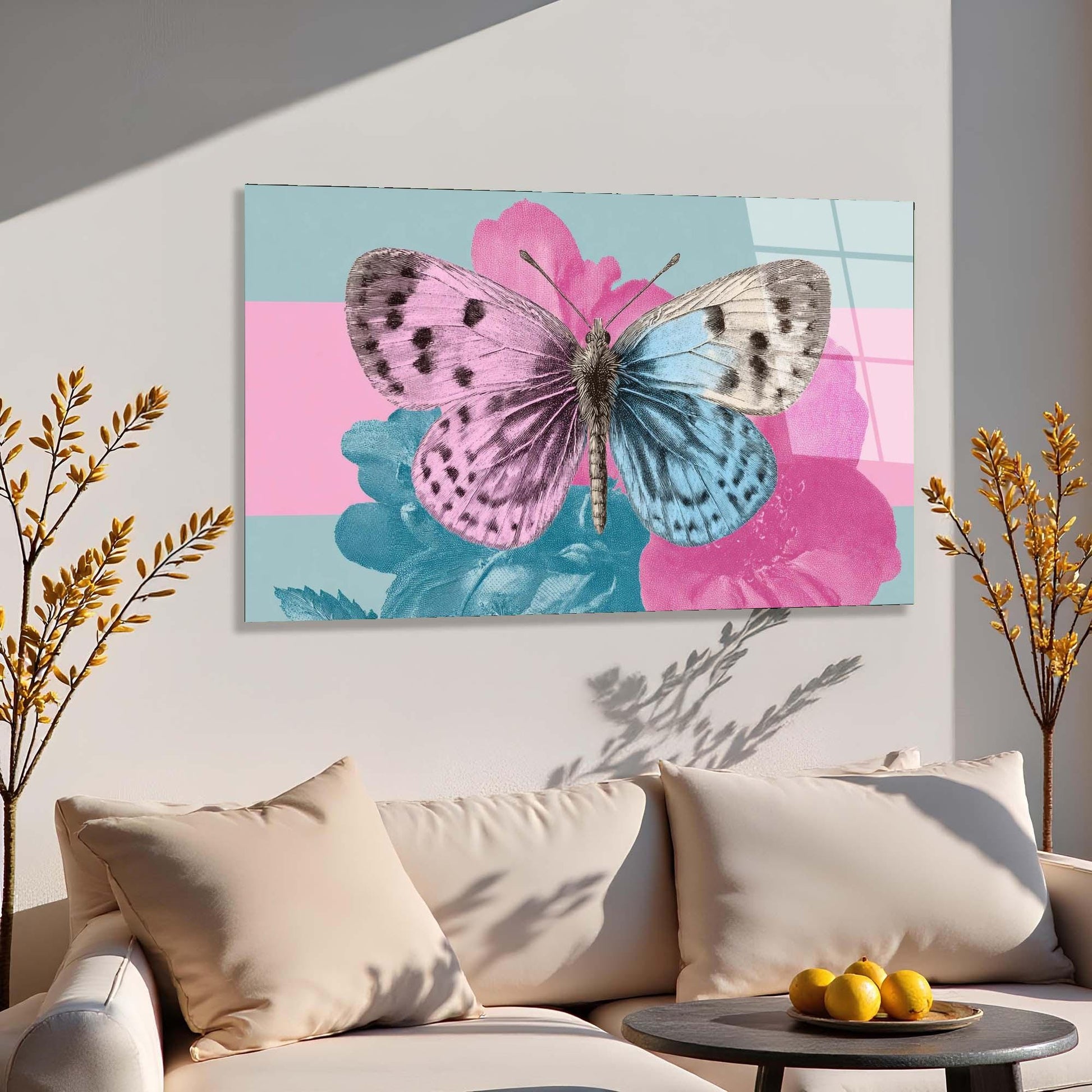Colorful butterfly painting on a wall above a sofa with decorative elements.