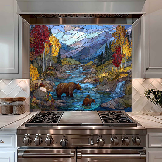 Stainless steel oven with a decorative glass panel featuring a bear and nature scene in a kitchen.