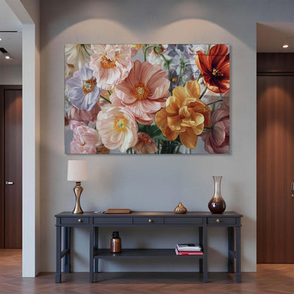 Floral painting above a console table in a room with wooden flooring and a gray wall.