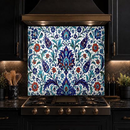 Vibrant blue and turquoise Iznik tile glass backsplash panel perfectly fitted behind an induction cooktop.