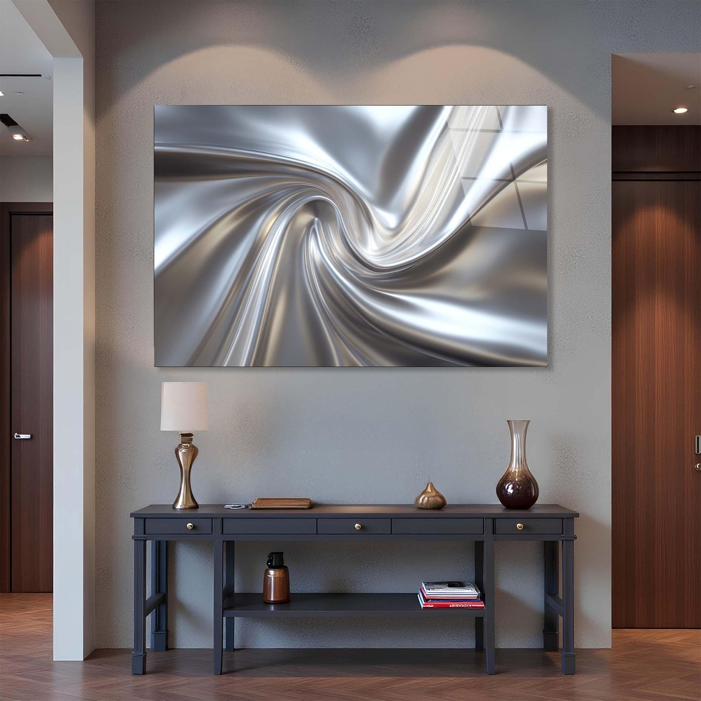 Modern interior with a large abstract metal sculpture on the wall above a dark wooden console table.