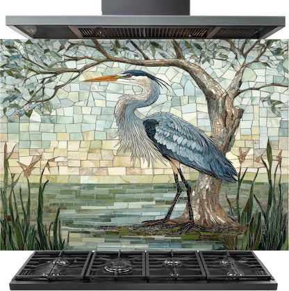 Mosaic artwork of a heron on a kitchen backsplash with stove below