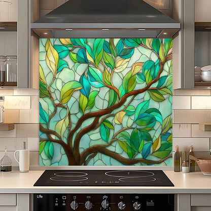 Decorative glass splashback with tree design in a kitchen