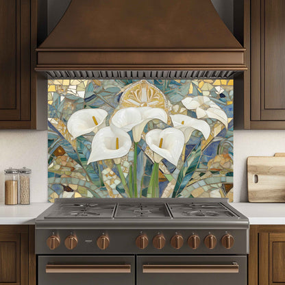 Decorative backsplash with floral mosaic design above a stove in a kitchen.