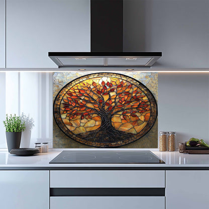 Kitchen with a decorative glass splashback featuring a tree of life design.