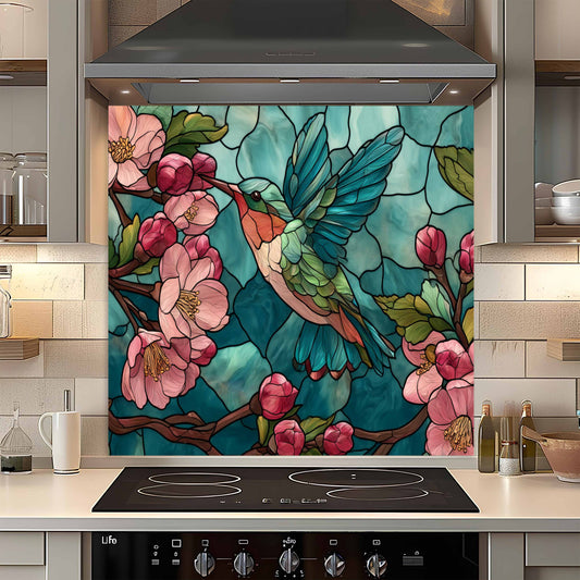 Decorative backsplash with stained glass-style design of a hummingbird and flowers in a kitchen.