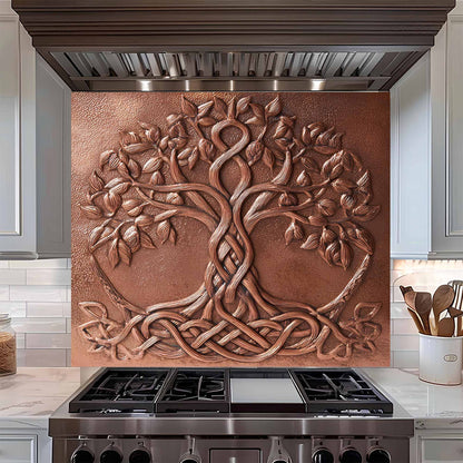 Decorative copper tree backsplash above a stove in a kitchen setting