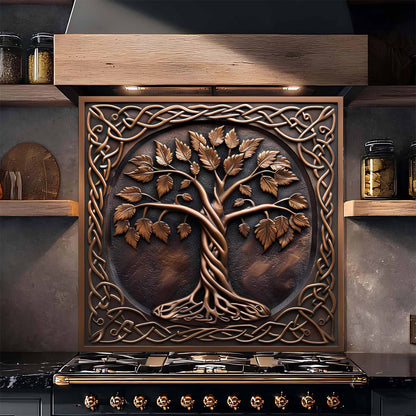 Decorative glass backsplash with tree design above a stove in a kitchen setting