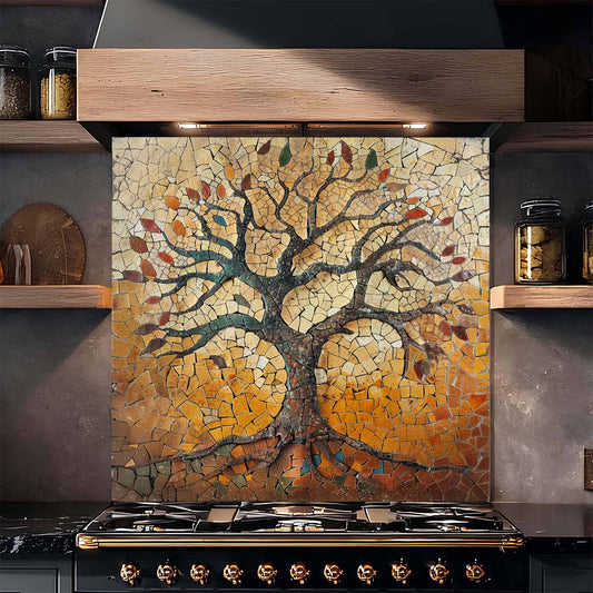 Mosaic tree design on a kitchen backsplash above a stove.