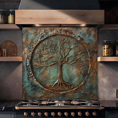 Decorative backsplash with tree design above a stove in a kitchen setting.