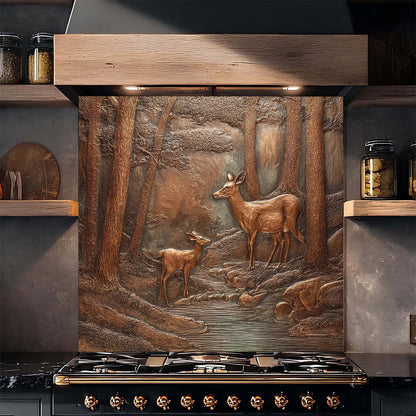 Decorative glass backsplash with deer scene in a forest design above a stove.