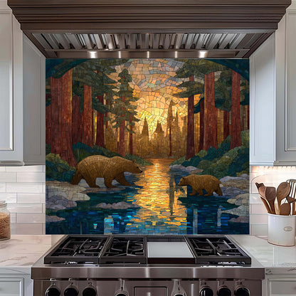 Stainless steel stove with a decorative glass backsplash featuring bears and a forest scene.