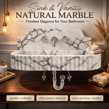 Marble sink with polished interior on a wooden vanity, featuring text about natural marble.
