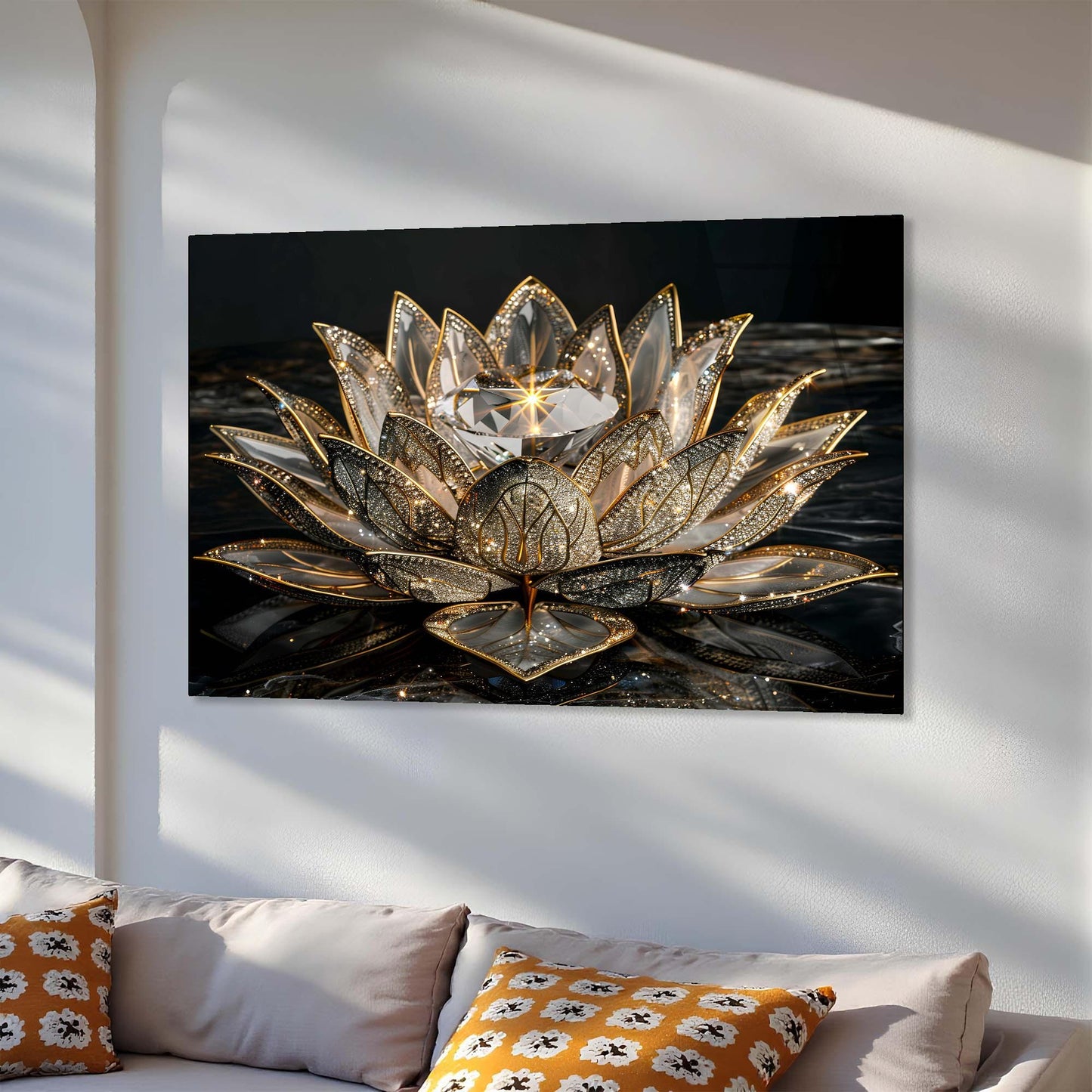 Decorative wall art of a gold lotus flower on a white wall above a sofa.