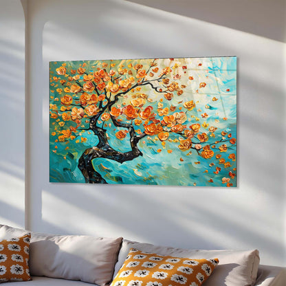 Colorful abstract painting of a tree with orange flowers on a white wall above a sofa.