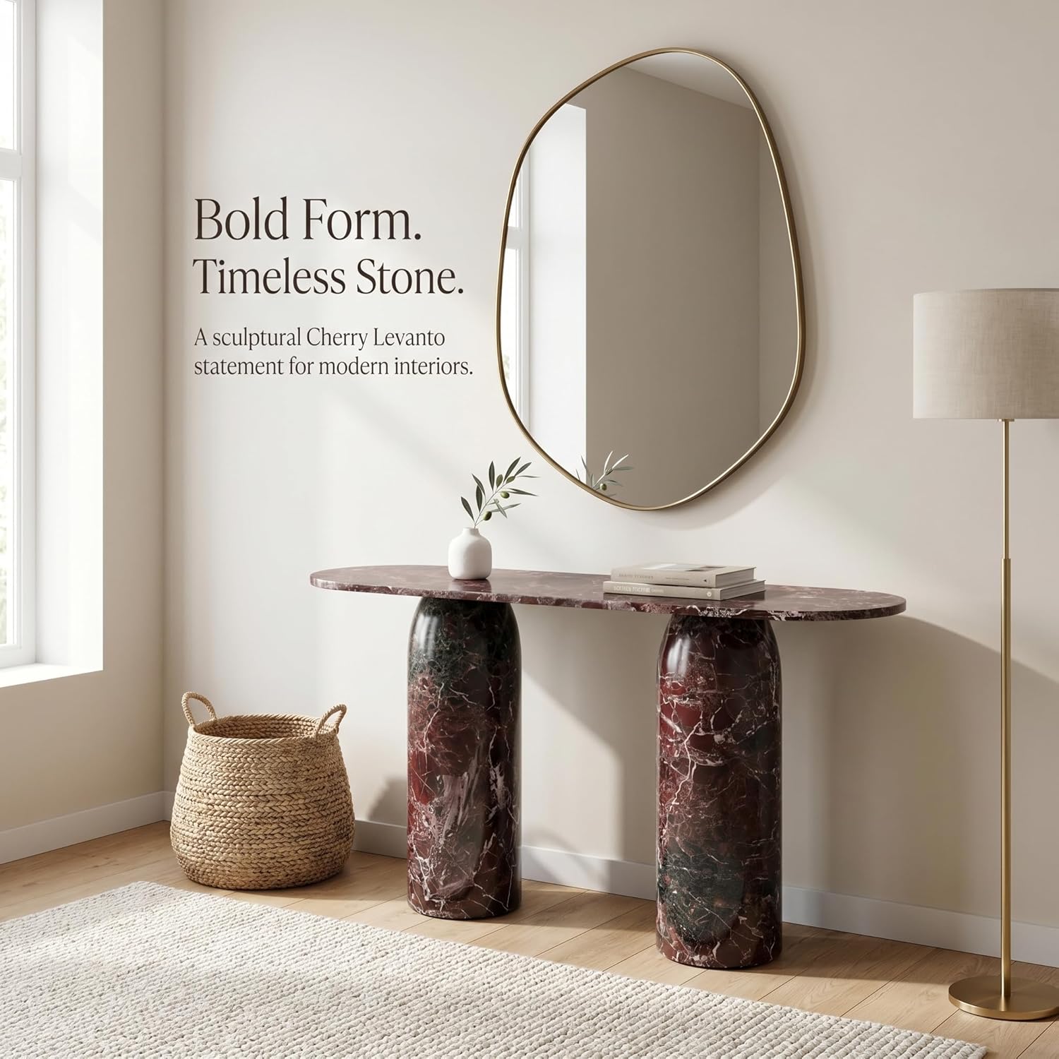Marble console table with oval mirror and decorative items in a room setting.