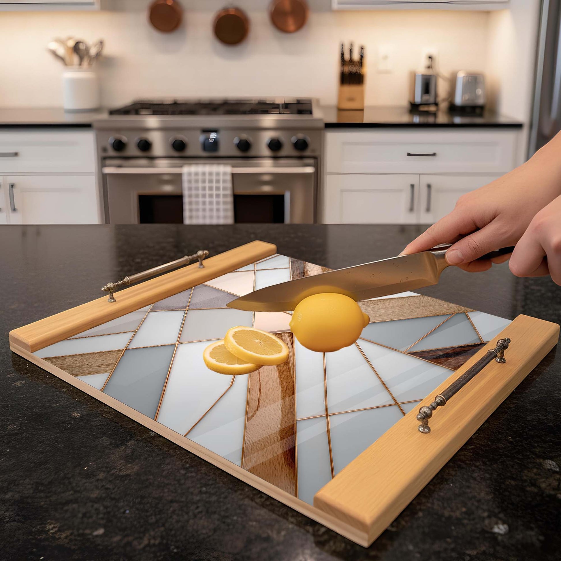 Person cutting a lemon on a geometric-patterned glass cutting board in a kitchen.