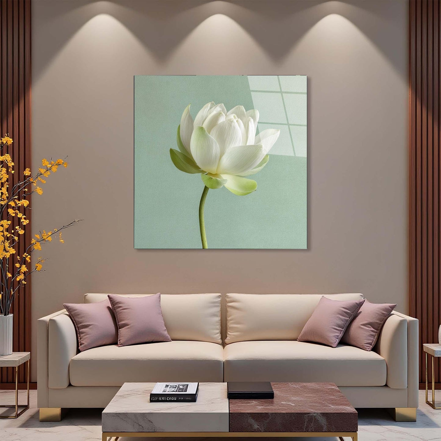 Modern living room with a beige sofa, decorative pillows, and a wall art piece of a white flower.
