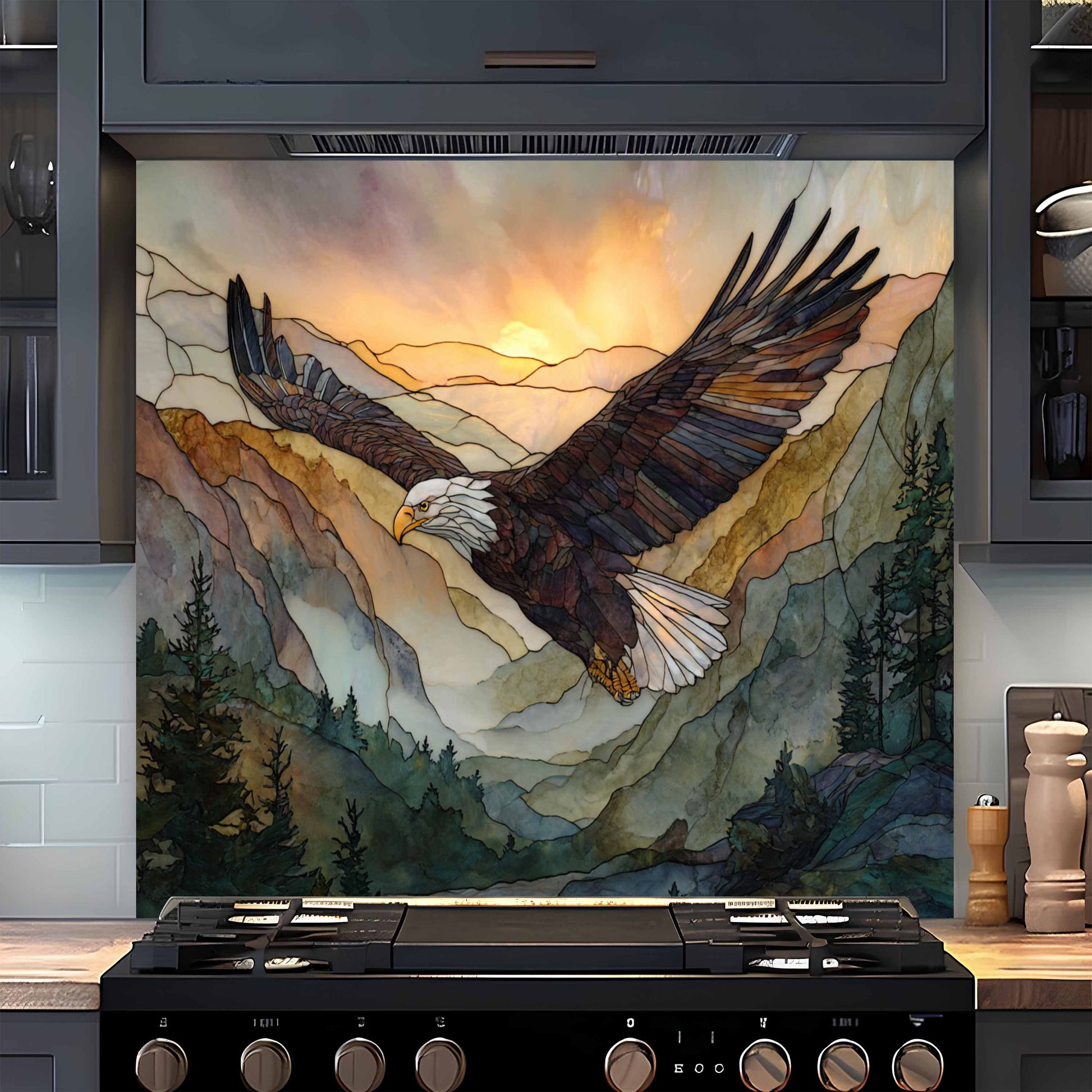 Decorative backsplash with an eagle and mountain scene in a kitchen.
