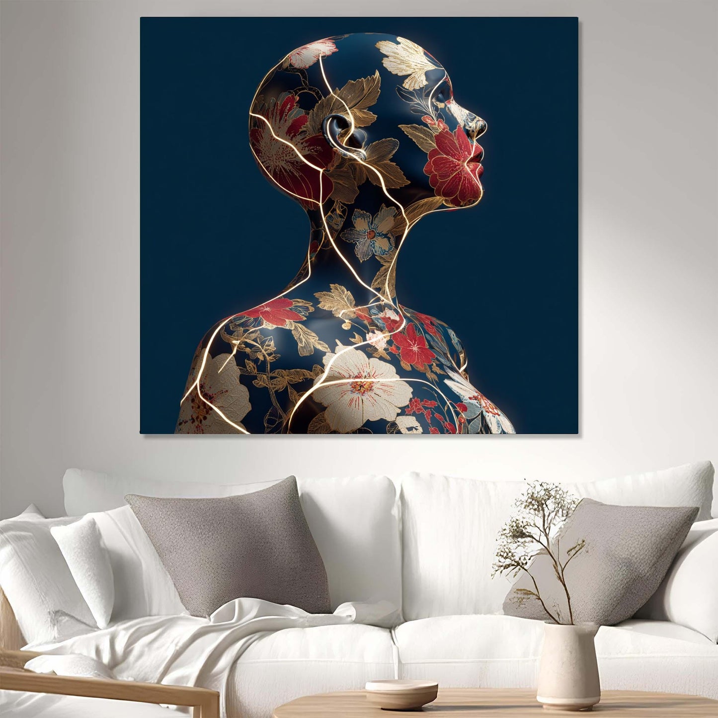 Decorative wall art of a stylized woman's profile with floral patterns in a living room.