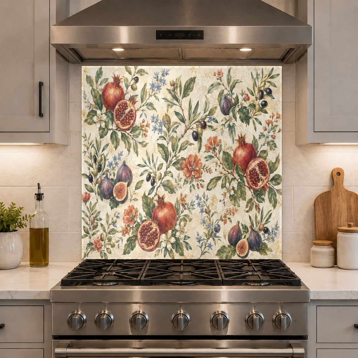 Stunning botanical pomegranate kitchen stove splash guard in a luxury kitchen with white cabinetry.