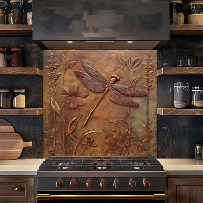 Decorative glass backsplash with floral and dragonfly design above a stove in a kitchen.