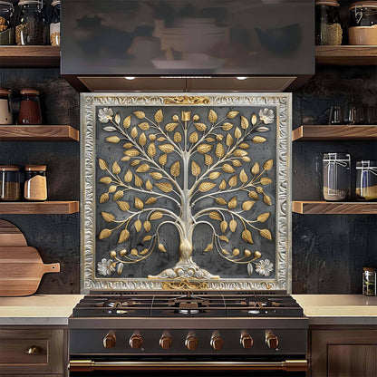 Decorative glass backsplash with a tree design above a stove in a kitchen setting.