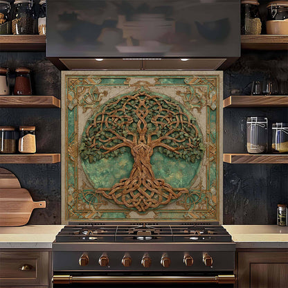 Decorative backsplash with a tree design above a stove in a kitchen setting.