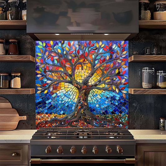 Colorful mosaic tree design on a kitchen backsplash above a stove.