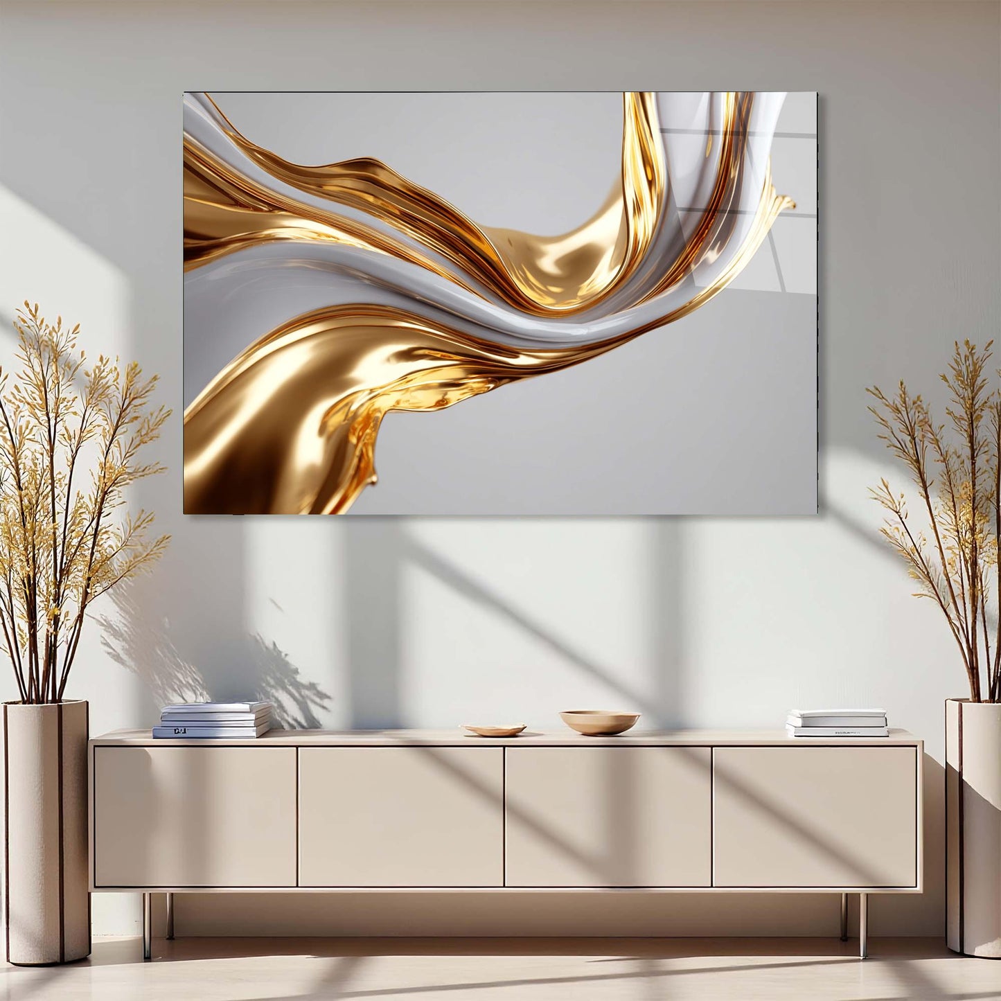 Abstract gold and white painting on a wall above a beige console table with decorative items.
