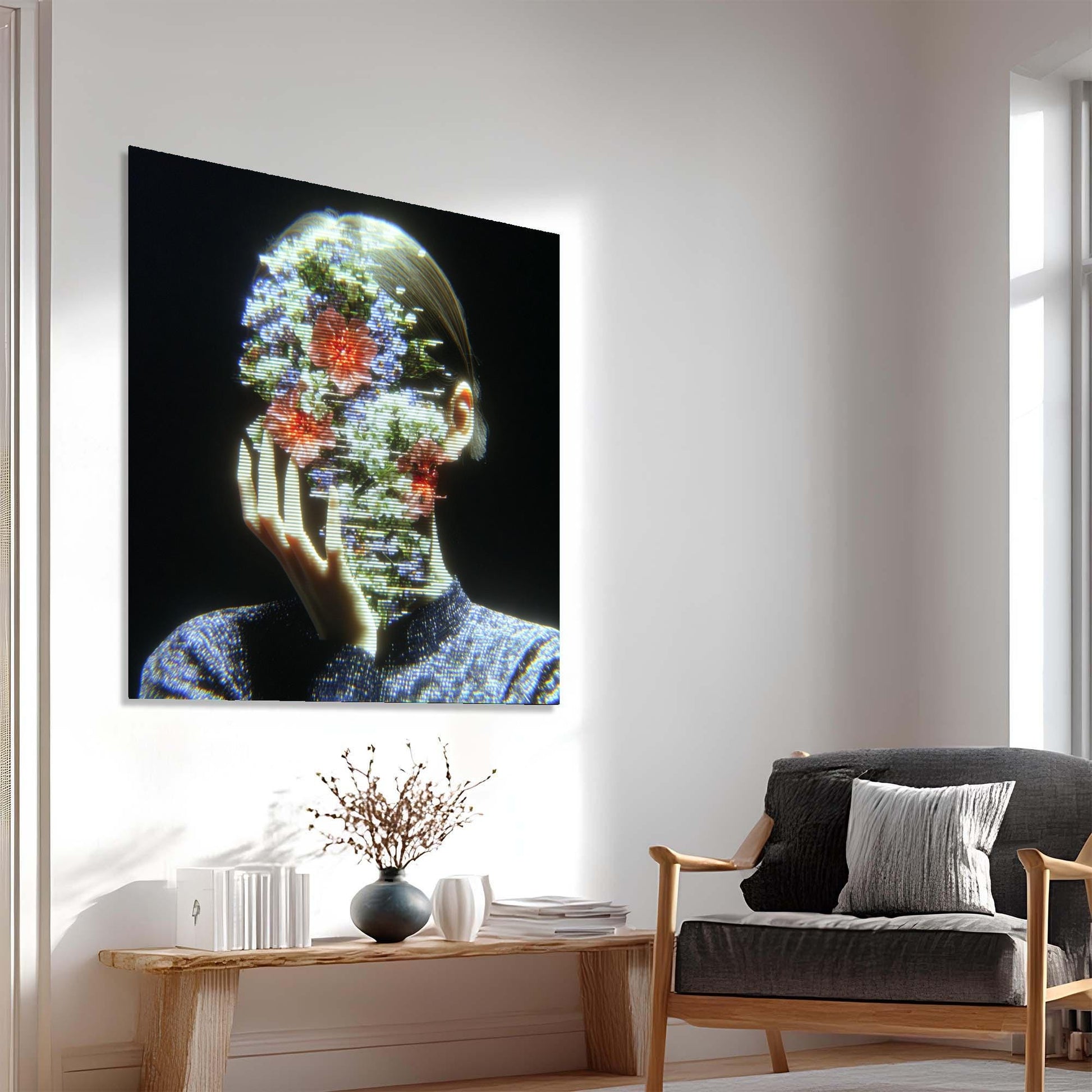 Modern living room with a large abstract painting of a person with flowers on their head.