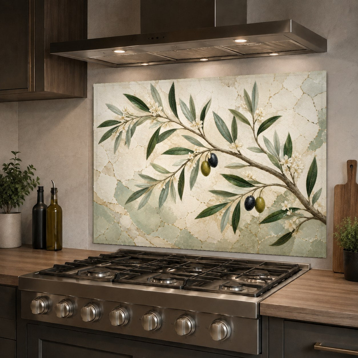 Elegant Mediterranean style glass backsplash behind a kitchen sink featuring soft leafy branches.