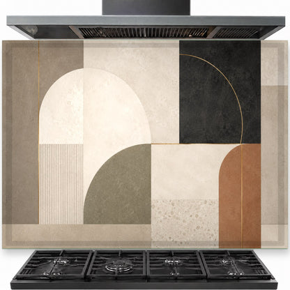 Urban Geometry tempered glass backsplash installed securely behind a stainless steel stove