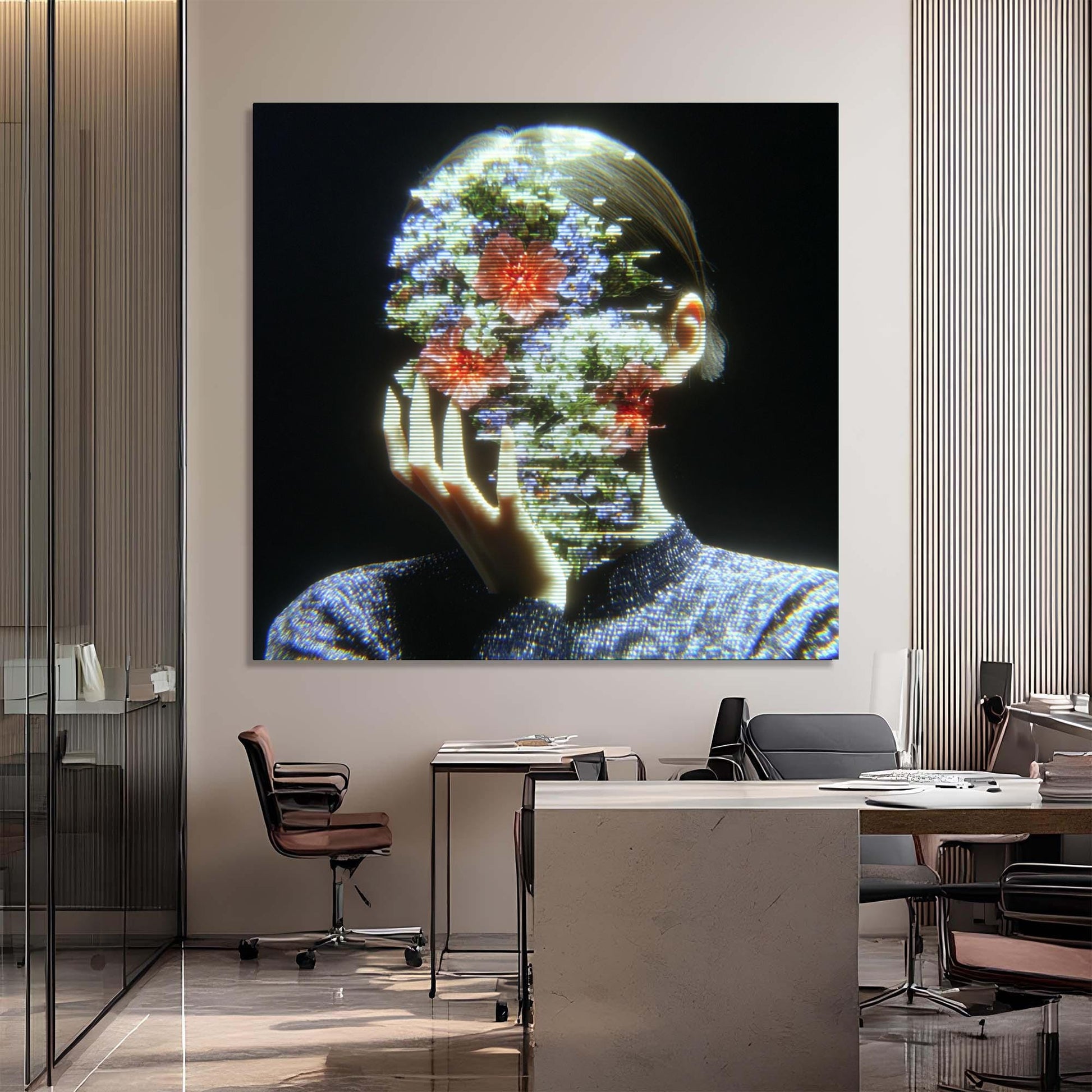 Modern office interior with a large digital art piece on the wall.