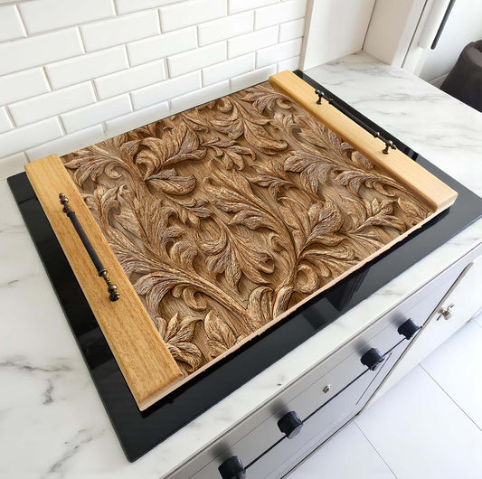 Decorative wooden panel with intricate carvings on a kitchen counter.