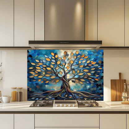 Decorative glass backsplash with a tree design in a kitchen