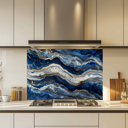 Kitchen with a blue and gold abstract patterned backsplash