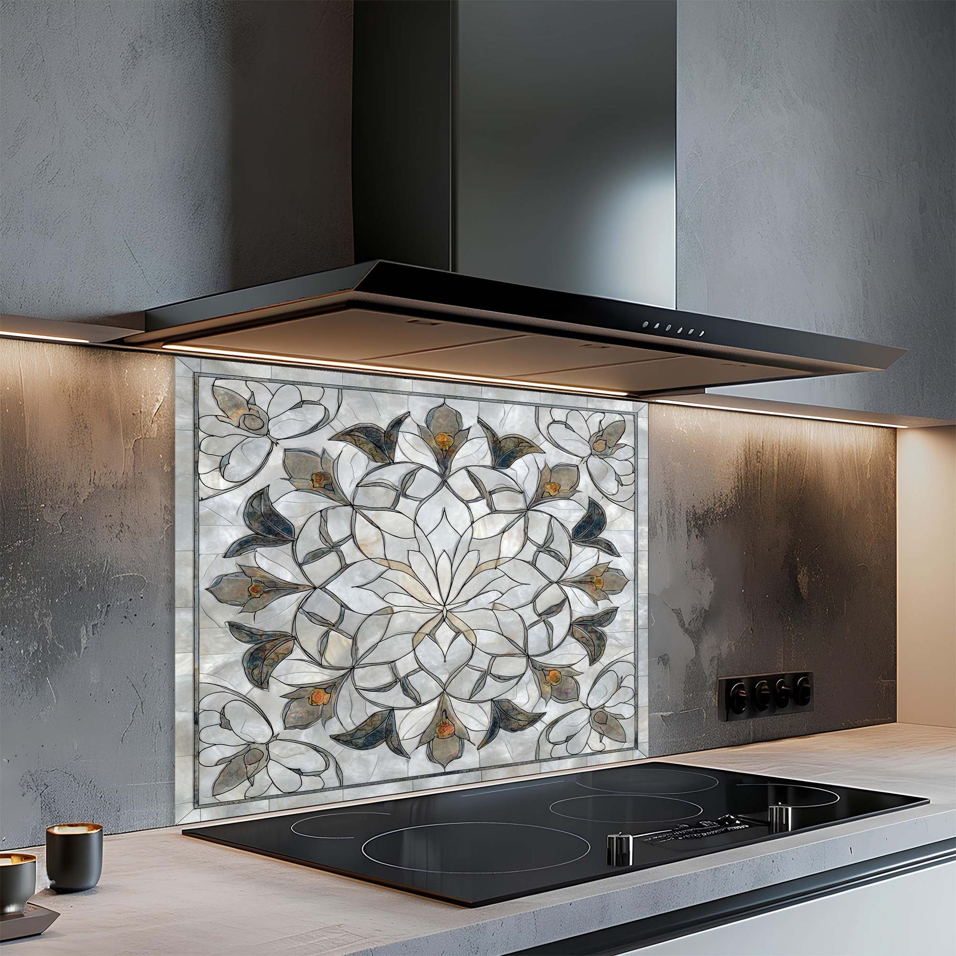 Modern kitchen with a decorative backsplash and induction cooktop.