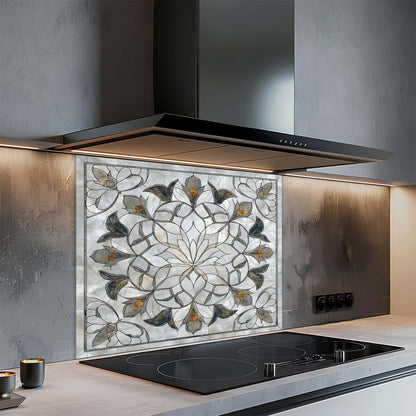 Modern kitchen with a decorative backsplash and induction cooktop.