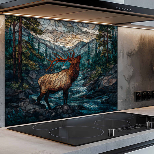 Kitchen with a decorative glass splashback featuring a deer in a forest scene.