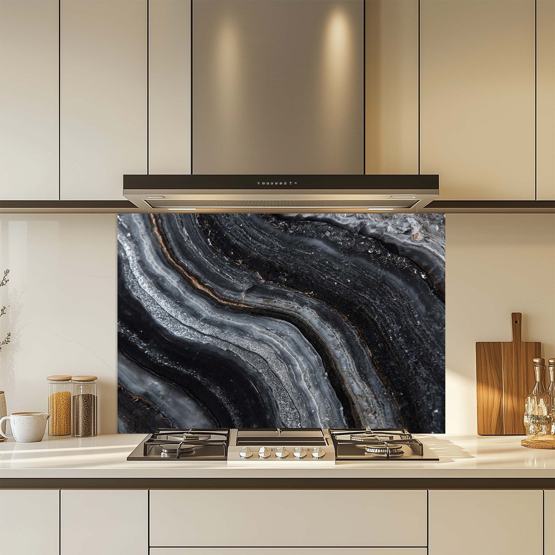 Kitchen with a decorative glass splashback featuring black and gray agate pattern.