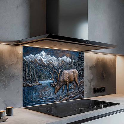 Modern kitchen with a decorative glass splashback featuring a deer and mountain scene.