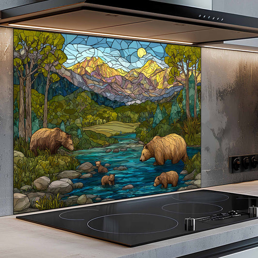Decorative glass splashback with bears and a mountain scene above a stove.