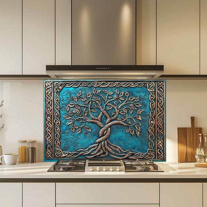 Decorative backsplash with a tree design over a kitchen stove