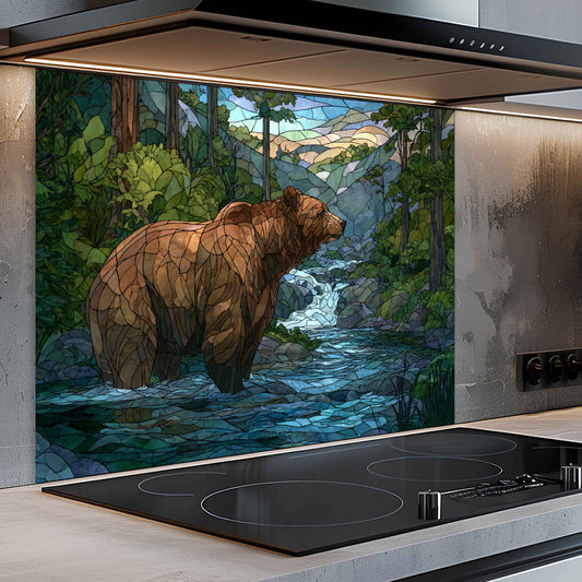 Stained glass-style bear artwork on a kitchen backsplash with a stove in the foreground.